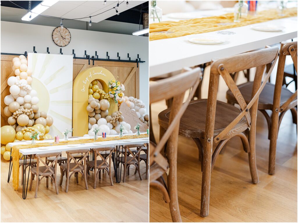 Sunny baby shower setup at Eagan Community Center with soft yellow tones, natural wood chairs, and floral arrangements in baskets.