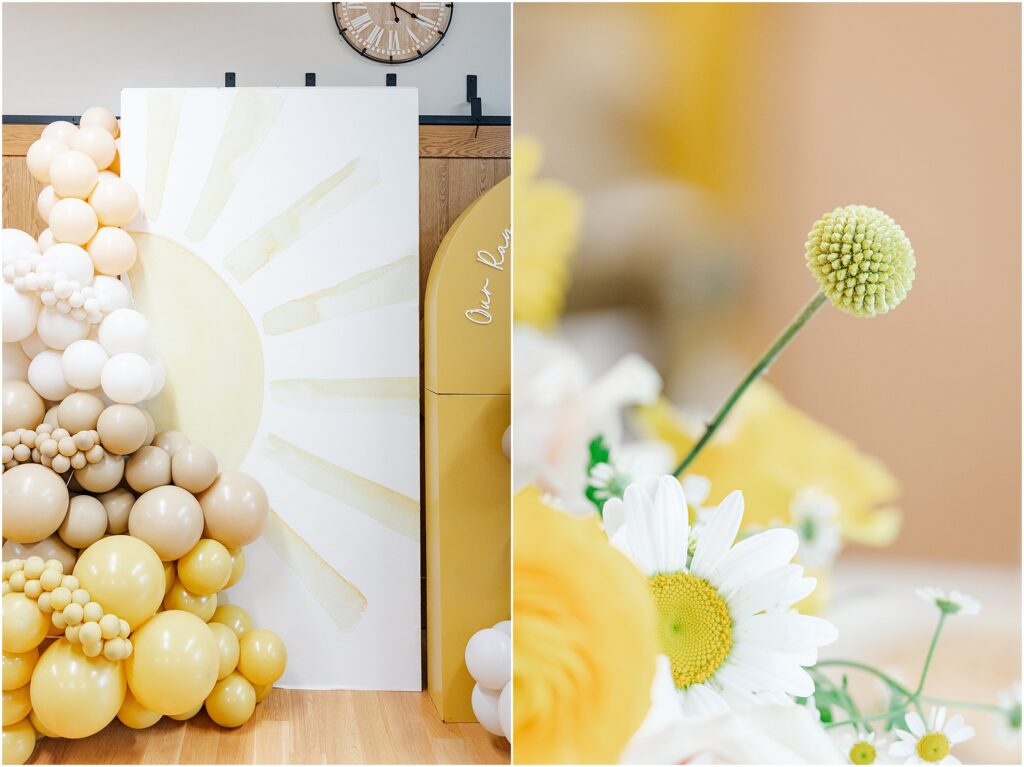 Sunny baby shower setup at Eagan Community Center with soft yellow tones, natural wood chairs, and floral arrangements in baskets.