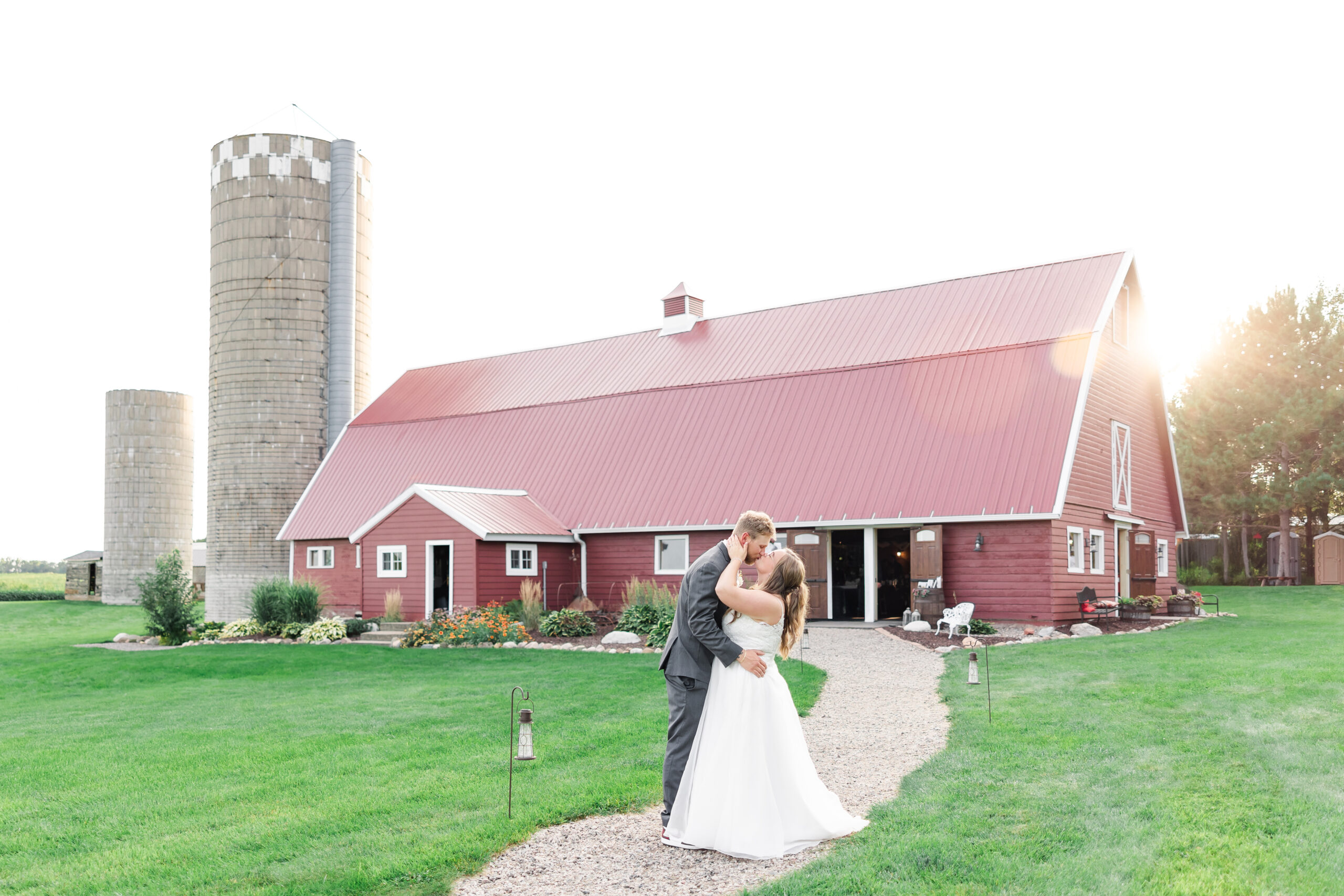 A couple sharing a quiet moment during their wedding day at Pondview Farm, surrounded by rustic charm and golden sunset light.